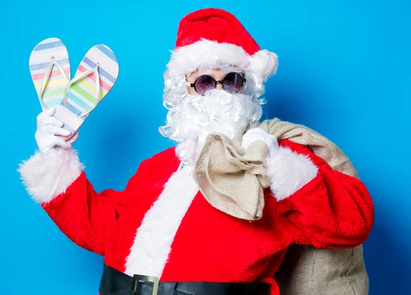 Zábavné Santa Claus bavit se s možnostmi žabky — Stock fotografie