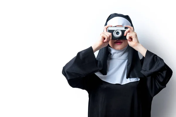 Smiling nun with photo camera — Stock Photo, Image