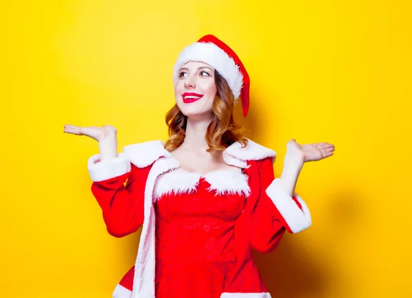 Young Santa  girl in red clothes — Stock Photo, Image