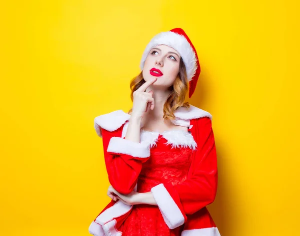 Young Santa girl in red clothes — Stock Photo, Image
