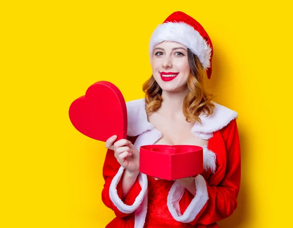 Santa chica con caja de regalo — Foto de Stock