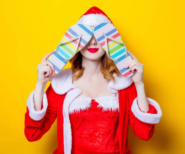 Santa  girl with  flip flops — Stock Photo, Image