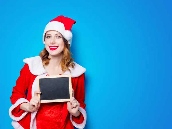 Santa  girl in red clothes with board — Stock Photo, Image