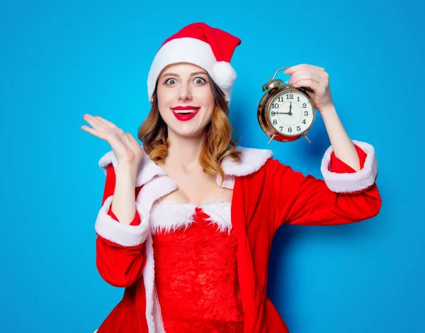 Santa  girl in red clothes with  alarm clock — Stock Photo, Image