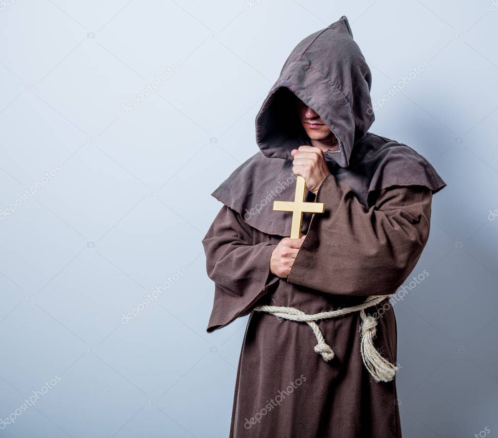 catholic monk with cross