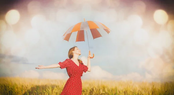 Krásná mladá žena s deštníkem — Stock fotografie