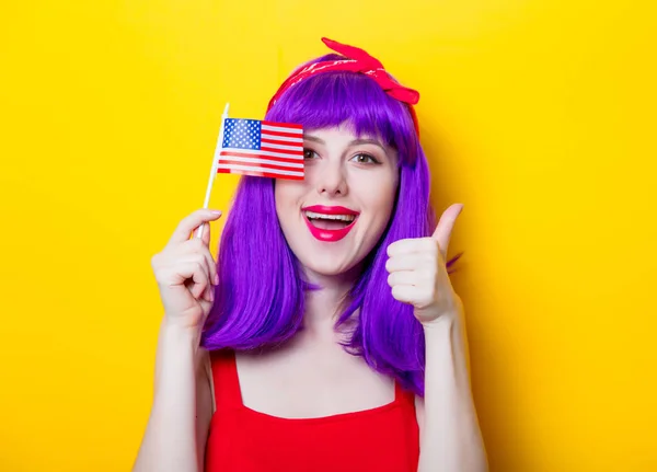 Young woman holding USA flag — Stock Photo, Image