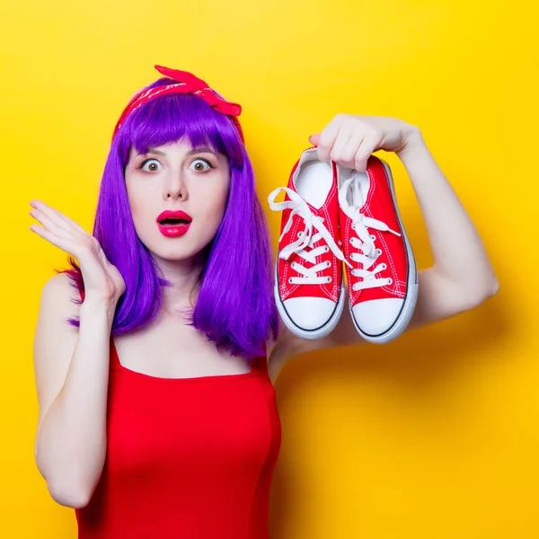 Young woman with sneakers — Stock Photo, Image