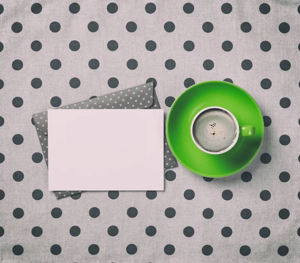 Cup of coffee and envelope — Stock Photo, Image