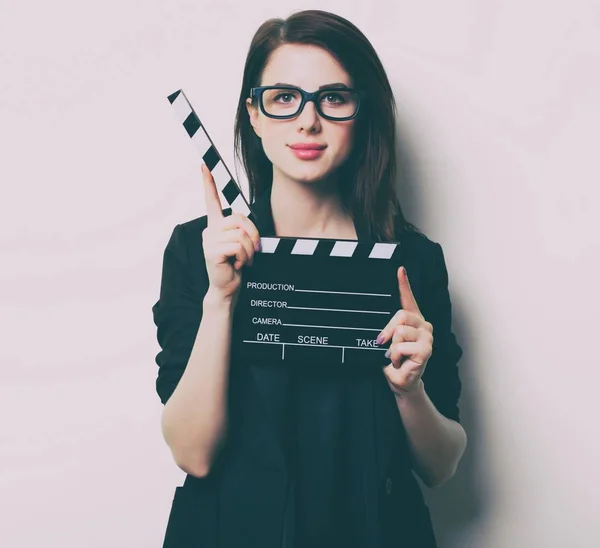 Young woman with slapstick — Stock Photo, Image