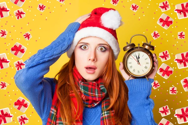 Redhead girl with alarm clock — Stock Photo, Image