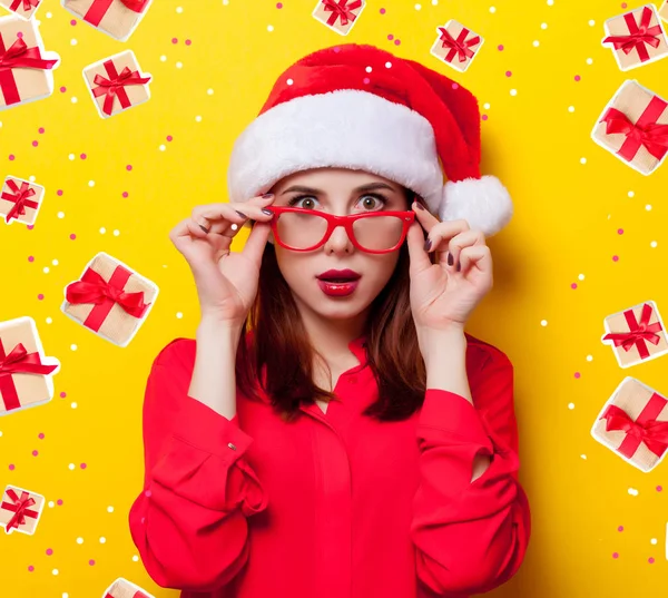 Woman in Santa Claus hat — Stock Photo, Image