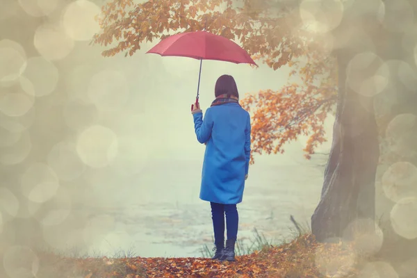 Brunette girl with umbrella — Stock Photo, Image