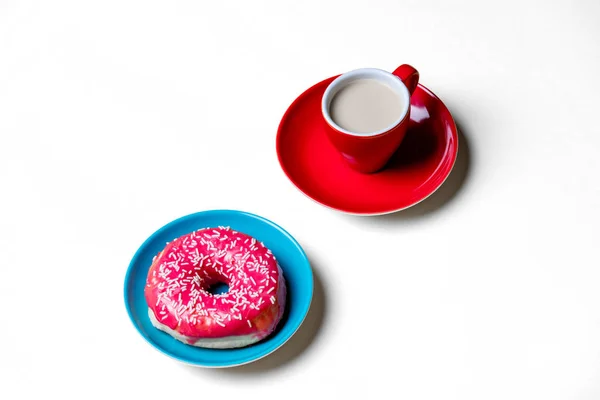 Donut en kopje koffie — Stockfoto