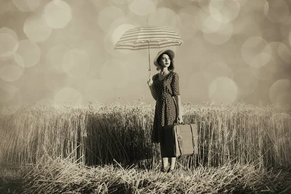 Young woman with umbrella — Stock Photo, Image