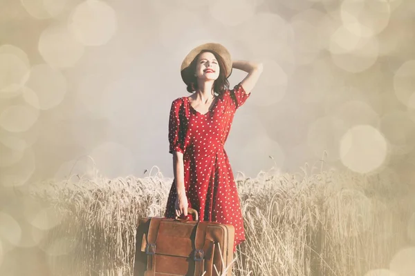 Young woman with suitcase — Stock Photo, Image