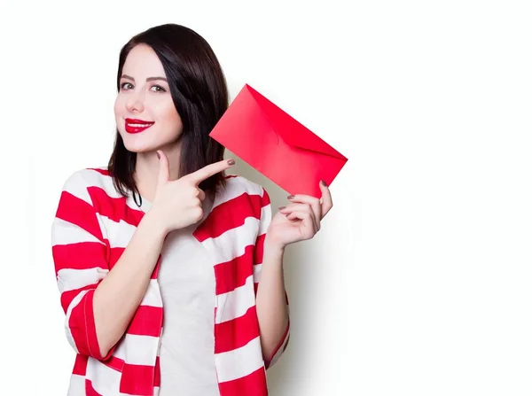 Menina segurando presente vermelho — Fotografia de Stock