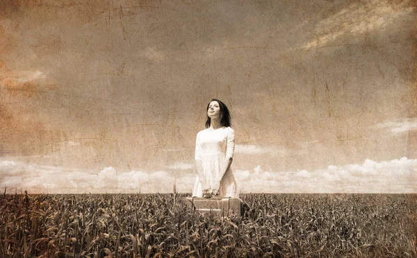 Young woman with suitcase — Stock Photo, Image