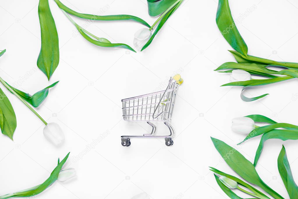 Shopping cart and tulips