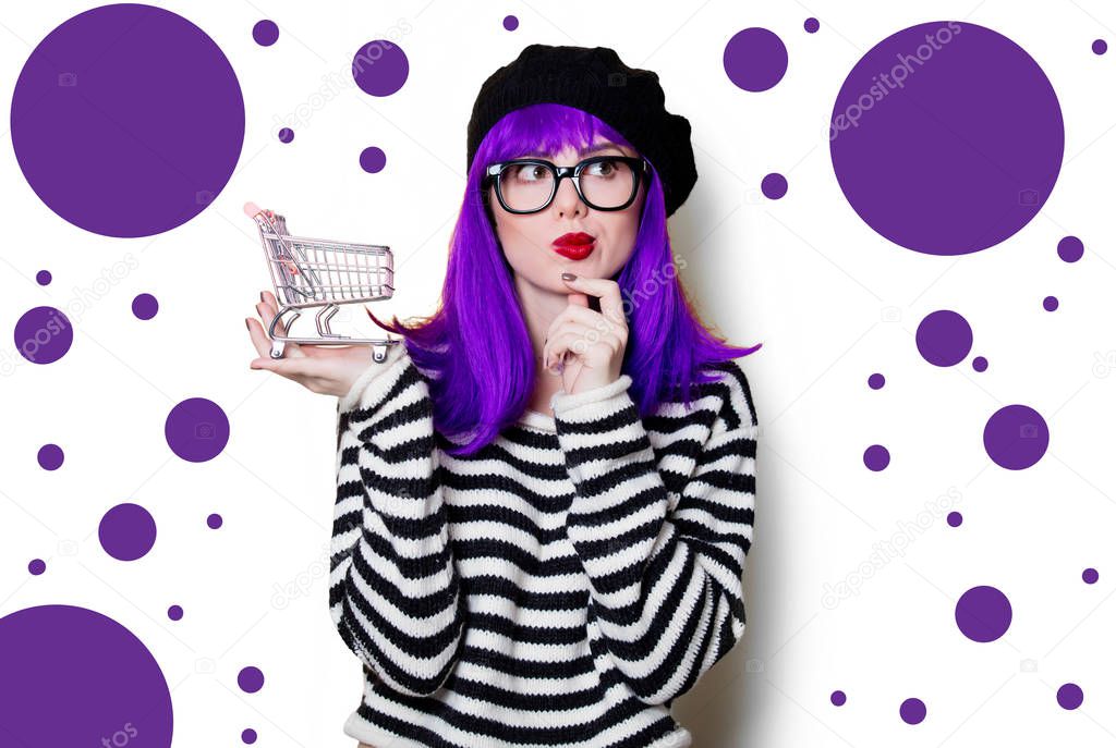 Woman with purple hair and shopping cart