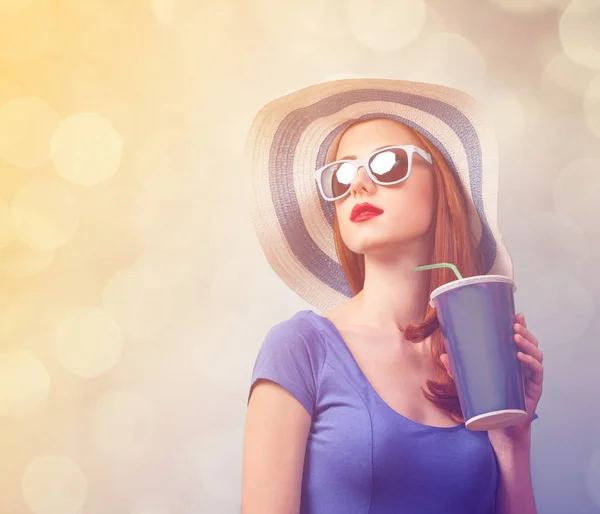 Redhead girl with drink — Stock Photo, Image