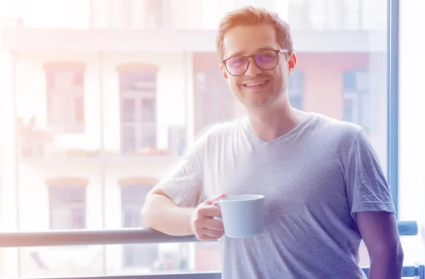 Man with cup of coffee — Stock Photo, Image