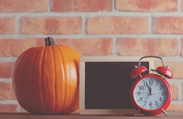 Autumn pumpkin on table — Stock Photo, Image