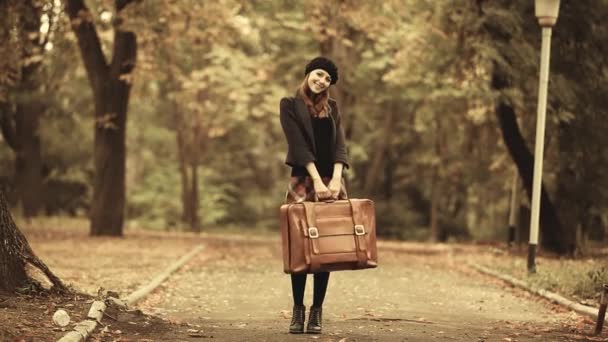 Young woman with suitcase — Stock Video