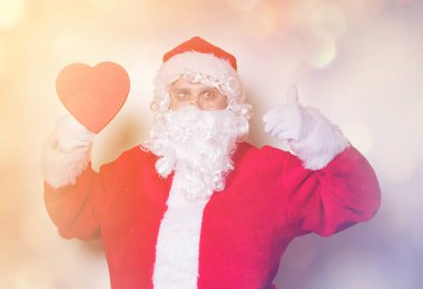 Noel Baba holding hediye