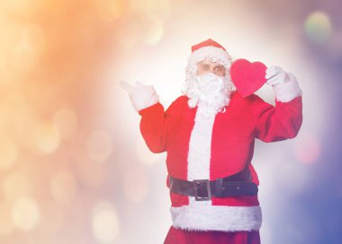 Noel Baba holding hediye