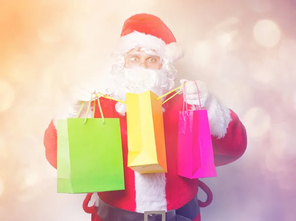 Santa Claus con bolsas de compras — Foto de Stock