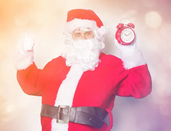 Santa Claus wtih alarm clock — Stock Photo, Image