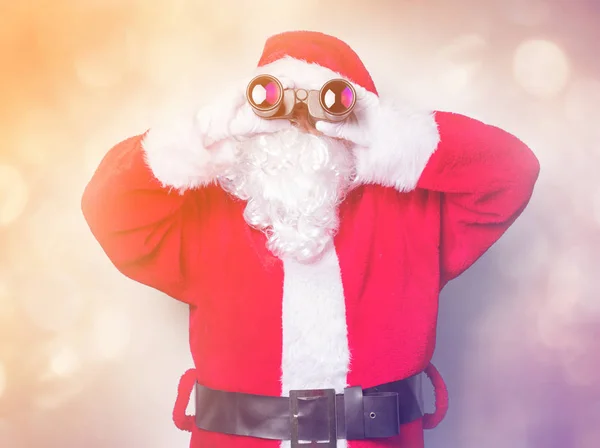 Santa Claus with binoculars — Stock Photo, Image