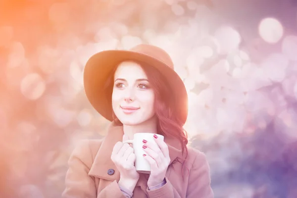 Woman with cup of coffee — Stock Photo, Image