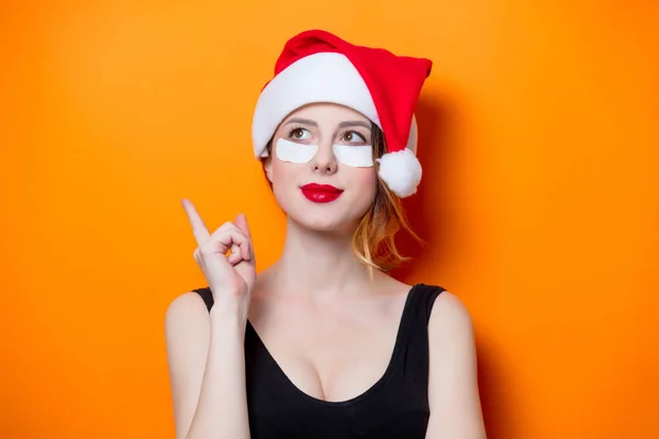 Donna con cappello di Babbo Natale — Foto Stock
