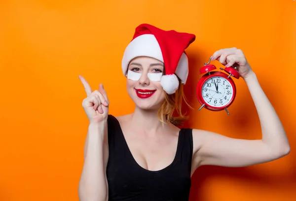 Mujer con despertador — Foto de Stock