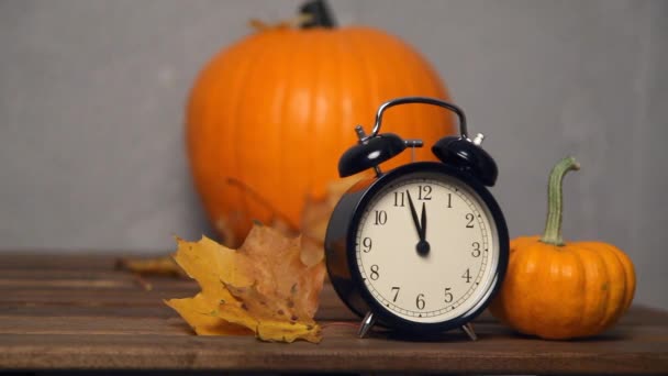 Retro alarm clock with pumpkins — Stock Video