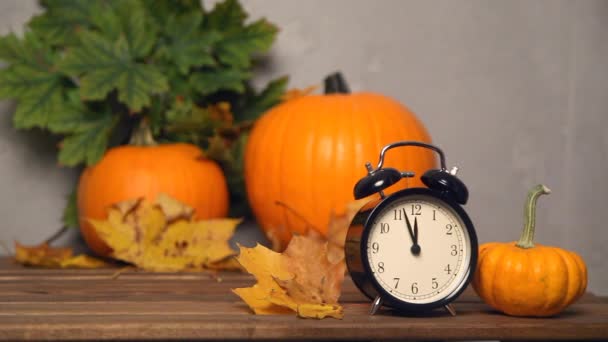 Retro alarm clock with pumpkins — Stock Video
