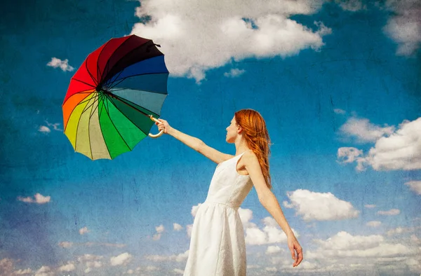 Redhead girl holding umbrella — Stock Photo, Image