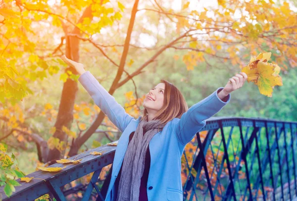 Redhead woman in blue coat — Stock Photo, Image