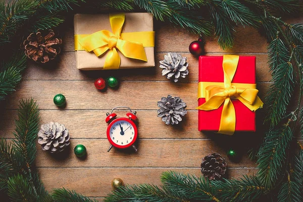 Christmas gift boxes and clock — Stock Photo, Image