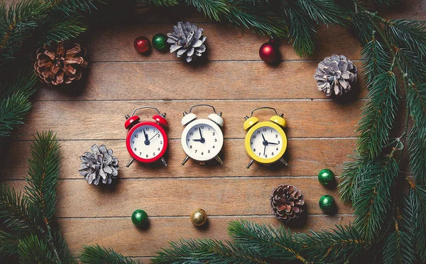 Christmas decoration and alarm clocks — Stock Photo, Image