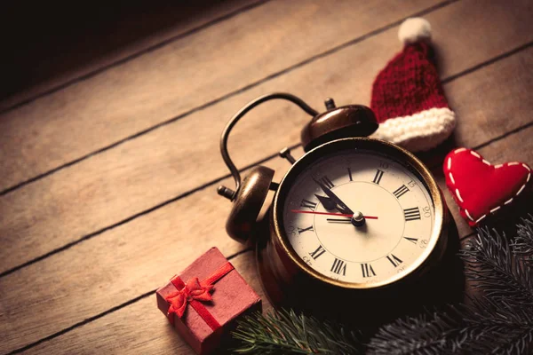 Christmas decoration and alarm clock — Stock Photo, Image