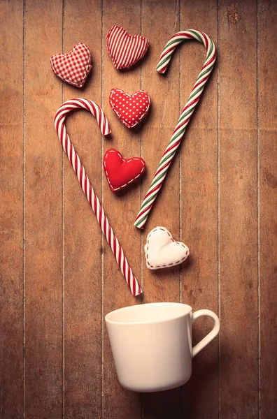White cup with heart shapes — Stock Photo, Image