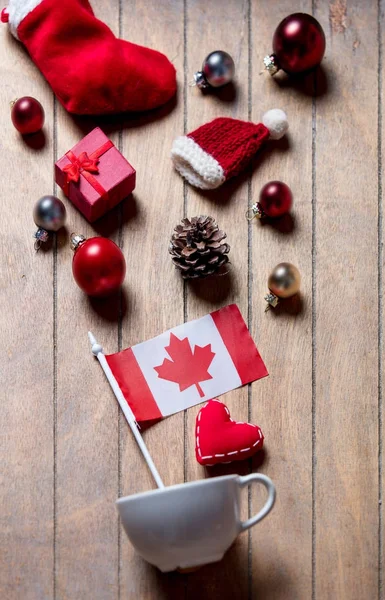 White cup and Christmas decoration — Stock Photo, Image