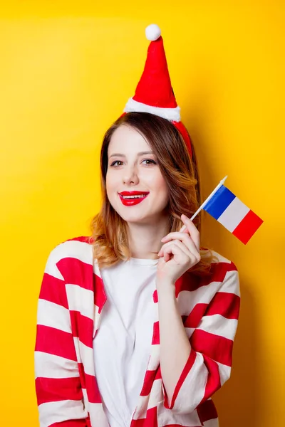 Rödhårig kvinna med Frankrike flagga — Stockfoto