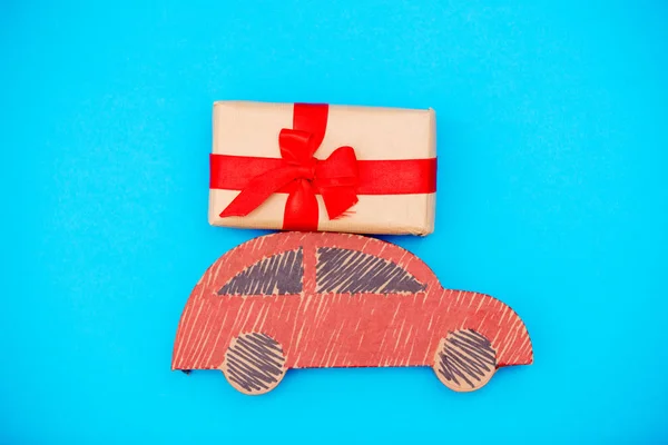 Red Handmade Car Delivery Christmas Gift Box Blue Background — Stock Photo, Image