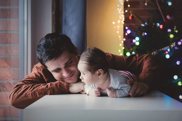 Young Father Help Little Child Lie Tummy First Time Indoor — Stock Photo, Image