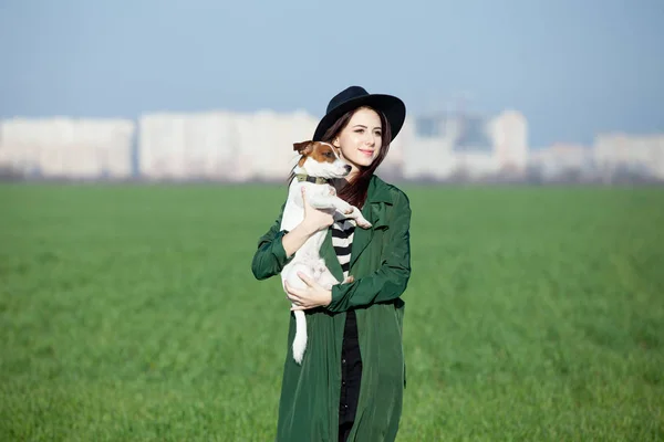 Young woman with dog — Stock Photo, Image