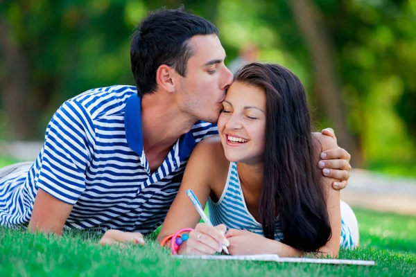 Young in love couple with in blue clothing — Stock Photo, Image